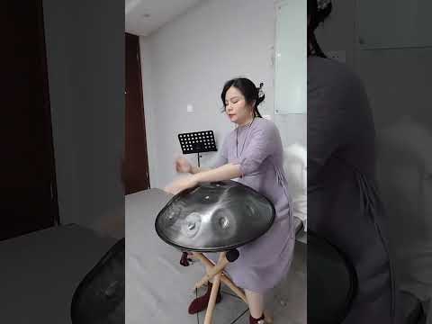 Handpan Princess plays "The Girl Who Fell from the Sky - Castle in the sky" on handpan