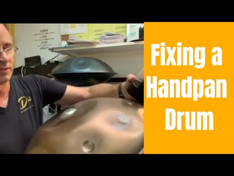 Adding a plastic cup to remove dissonance in a handpan