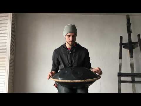 Alex Kseno plays on our handpan with the author's system based on the harmonic minor