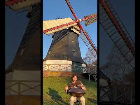 Handpan Handpan in front of windmill
