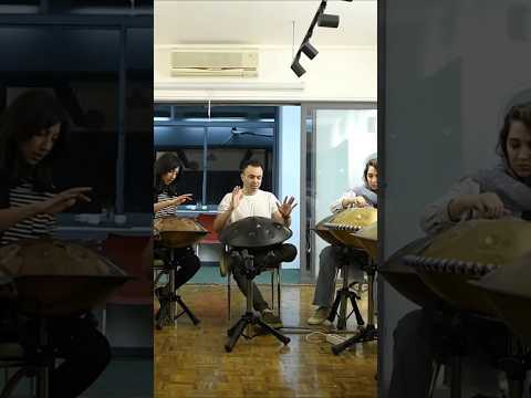 Group handpan training builds unity and rhythm as students learn together and support each other