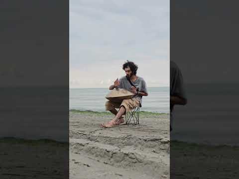 Playing Hang drum by the sea 🌊 #shorts