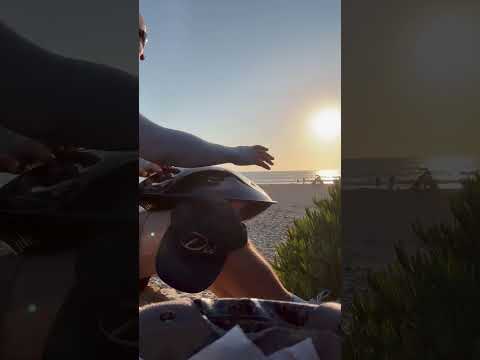 Playing Handpan on the Beach at Sunset